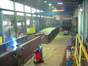 JUNG-Produktionshalle - 2 Traversen (Gewicht: 70 Tonnen pro Stück, Länge: 14.000 mm, Breite: 2.800 mm, Höhe: 2.200 mm)
